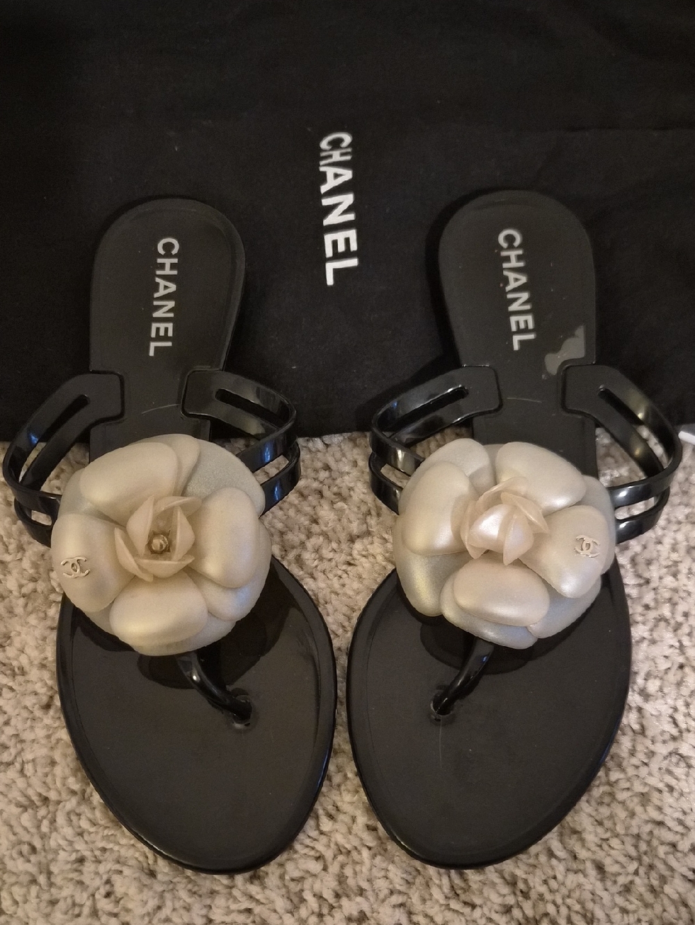 CHANEL Black Sandals with Cream Camellia Accents